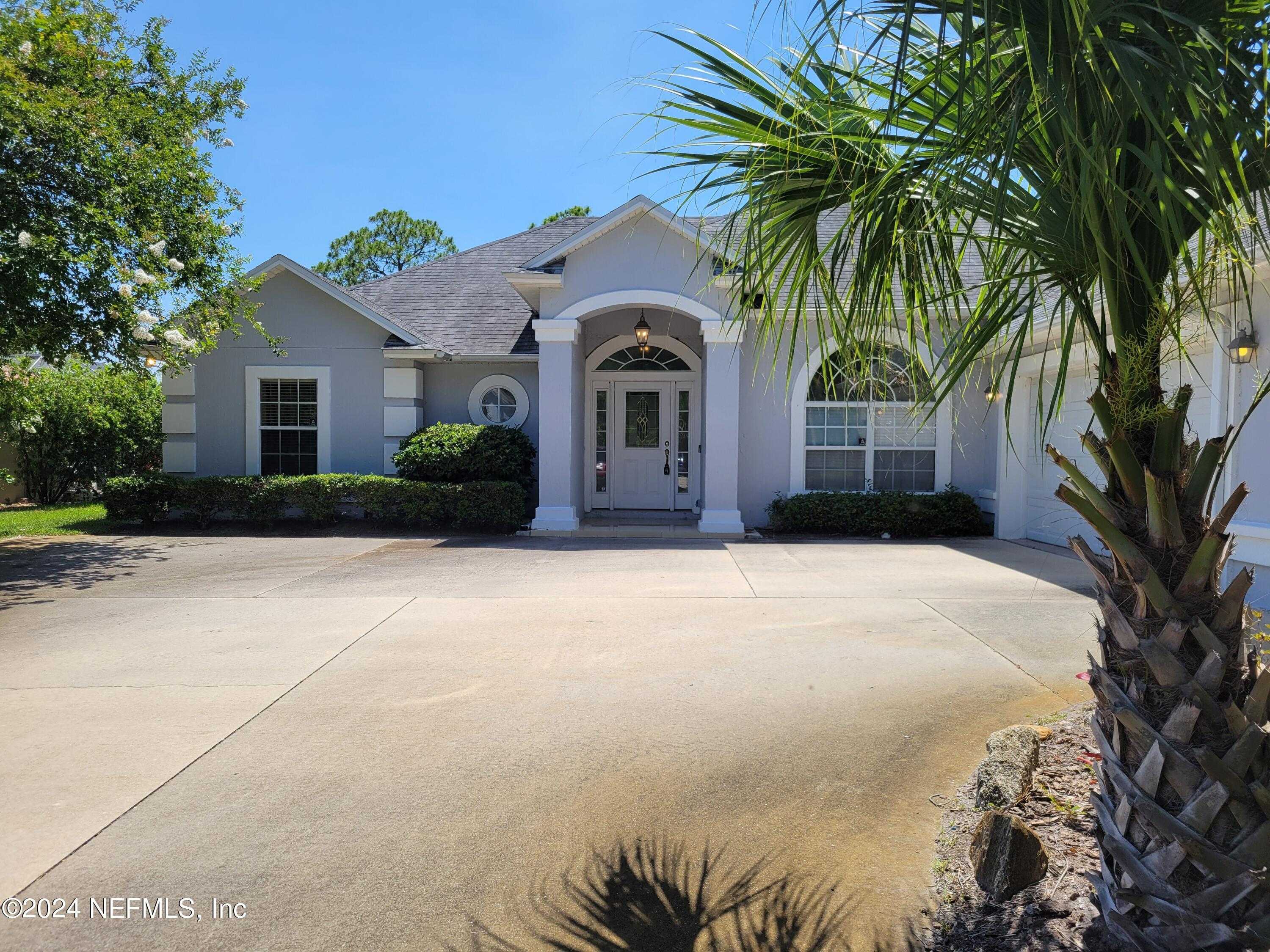 photo 1: 5504 CYPRESS LINKS Boulevard, Elkton FL 32033