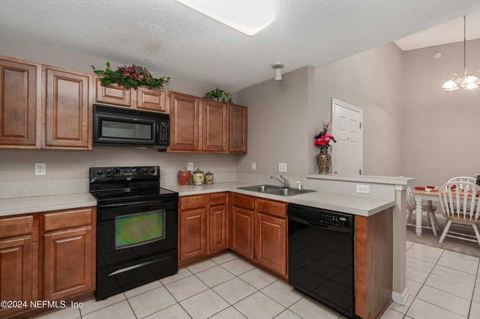 photo 2: 7920 MERRILL Road Unit 709, Jacksonville FL 32277