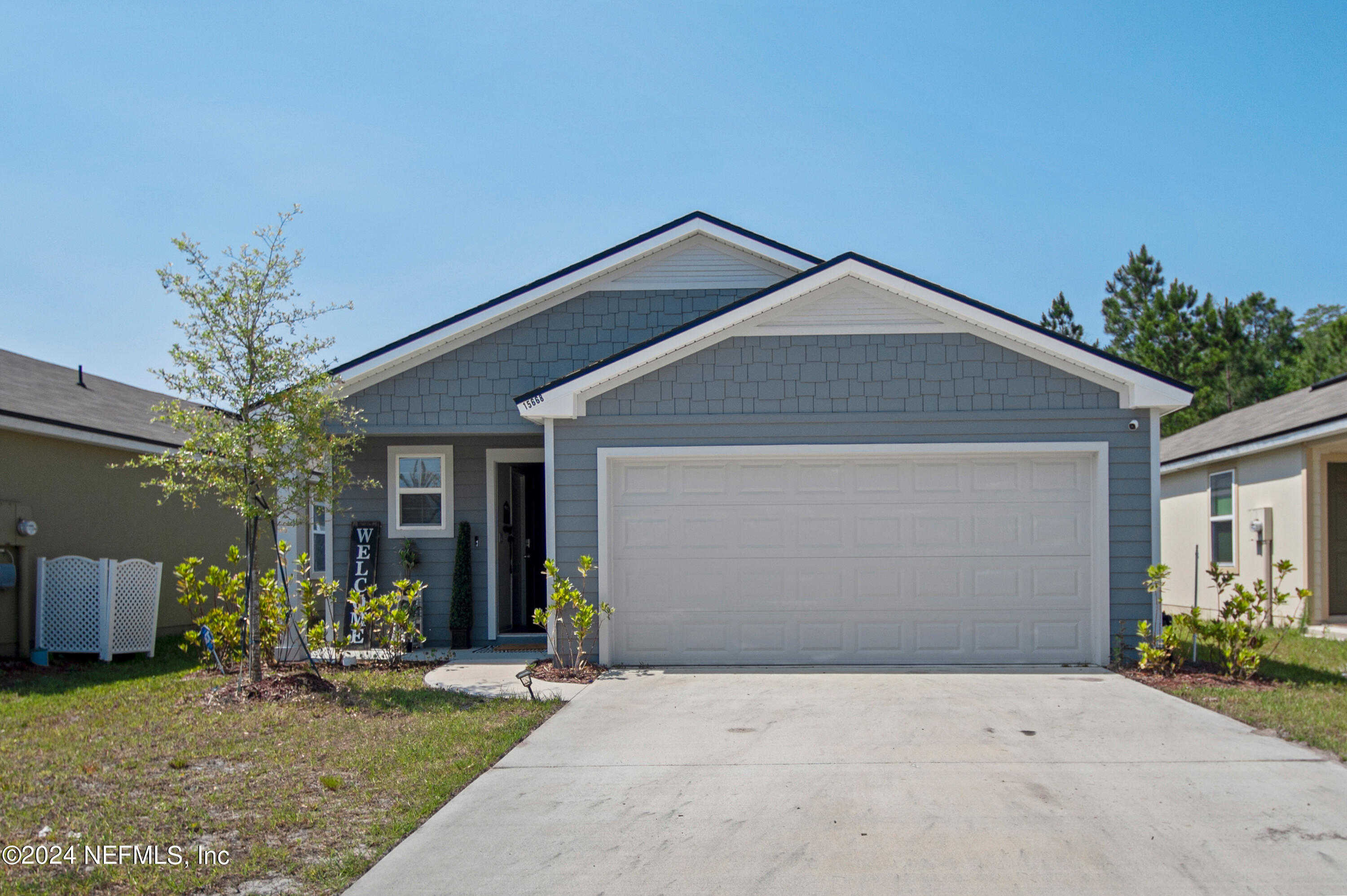 photo 1: 15668 STRAWBERRY ROAN Court, Jacksonville FL 32234