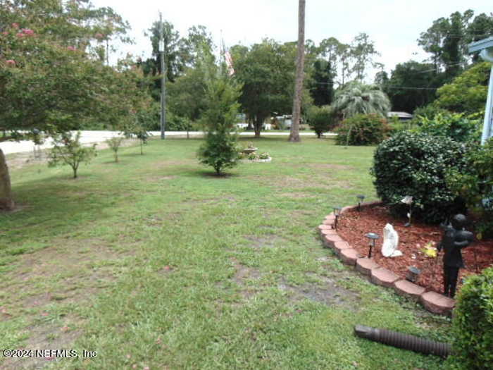 photo 2: 100 SHORELINE Avenue, Satsuma FL 32189