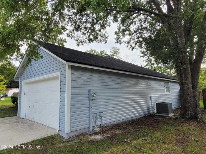 photo 2: 7000 HUNTINGTON WOODS Circle E, Jacksonville FL 32244