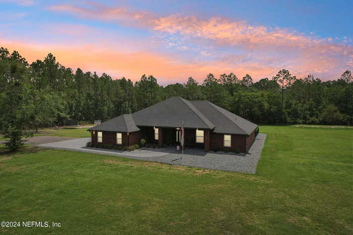 photo 1: 871 COUNTY ROAD 217, Maxville FL 32234