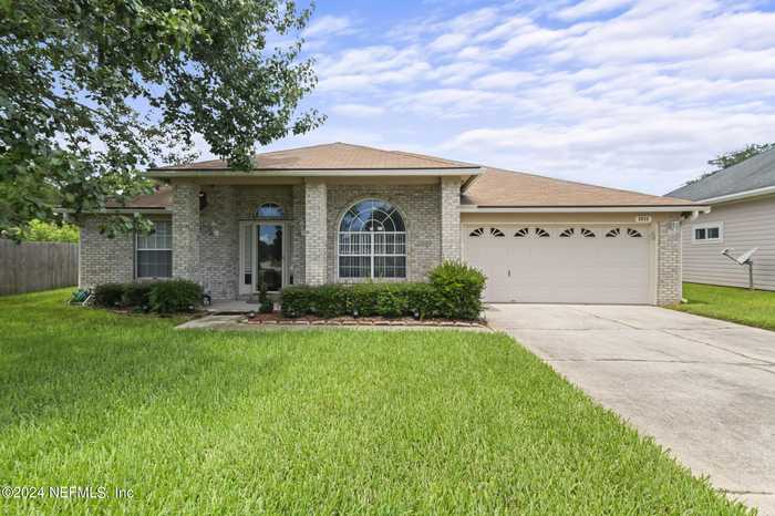 photo 1: 8058 BRIDGECREEK Drive W, Jacksonville FL 32244