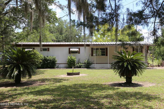 photo 1: 305 ST JOHNS Avenue, Satsuma FL 32189