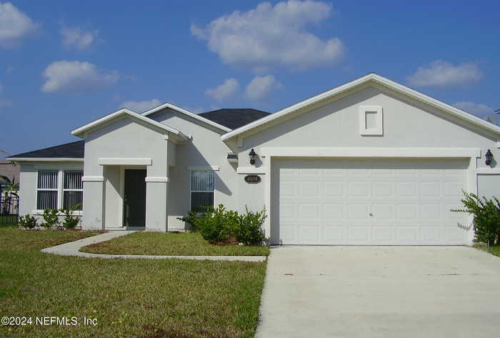 photo 1: 4104 PALMETTO BAY Drive, Elkton FL 32033