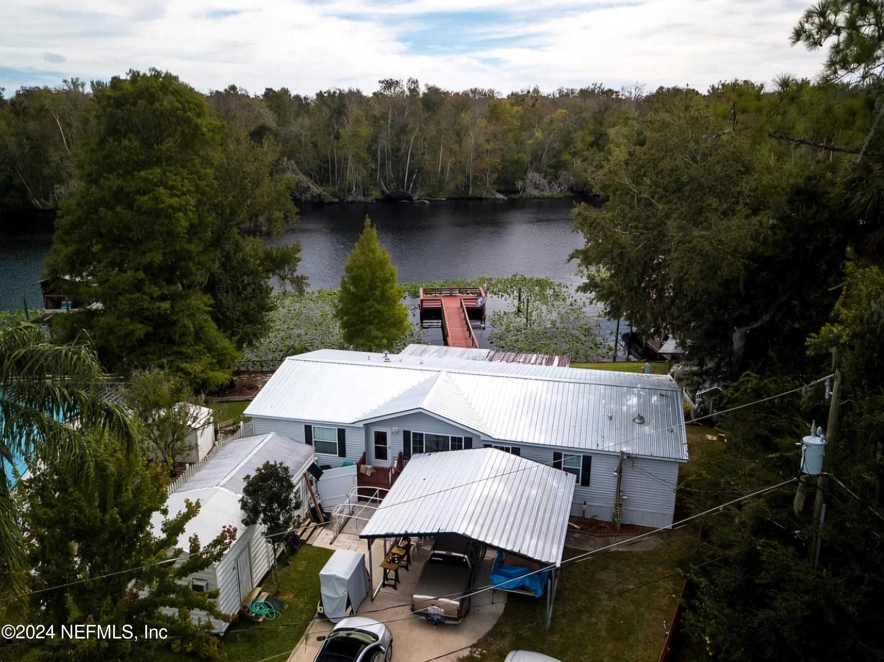 photo 1: 334 PARADISE Circle, Satsuma FL 32189