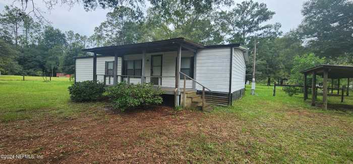 photo 1: 766 TOWERING PINES Drive, Jacksonville FL 32220