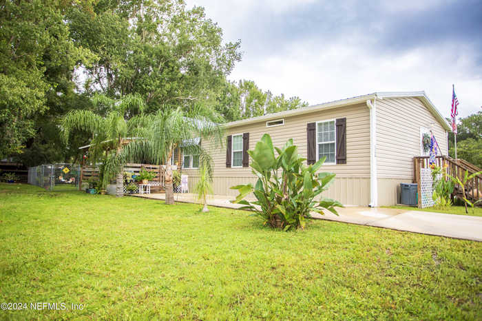 photo 2: 124 CREEKSIDE Road, Satsuma FL 32189