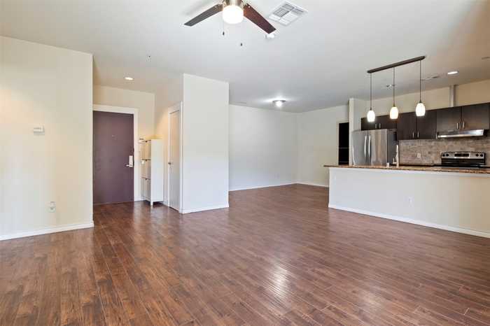 photo 1: 1100 W Trinity Mills Road Unit 2004, Carrollton TX 75006