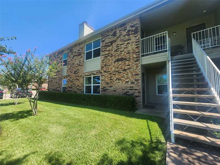 photo 1: 2200 E Trinity Mills Road Unit 401, Carrollton TX 75006