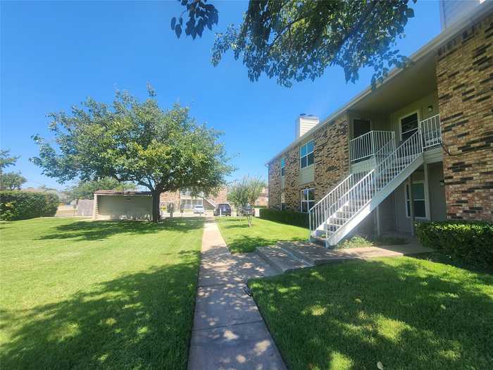 photo 2: 2200 E Trinity Mills Road Unit 401, Carrollton TX 75006