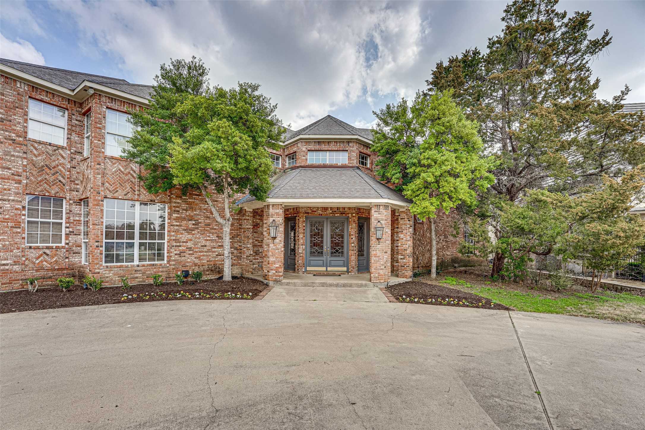 photo 2: 7007 Spanky Branch Court, Dallas TX 75248