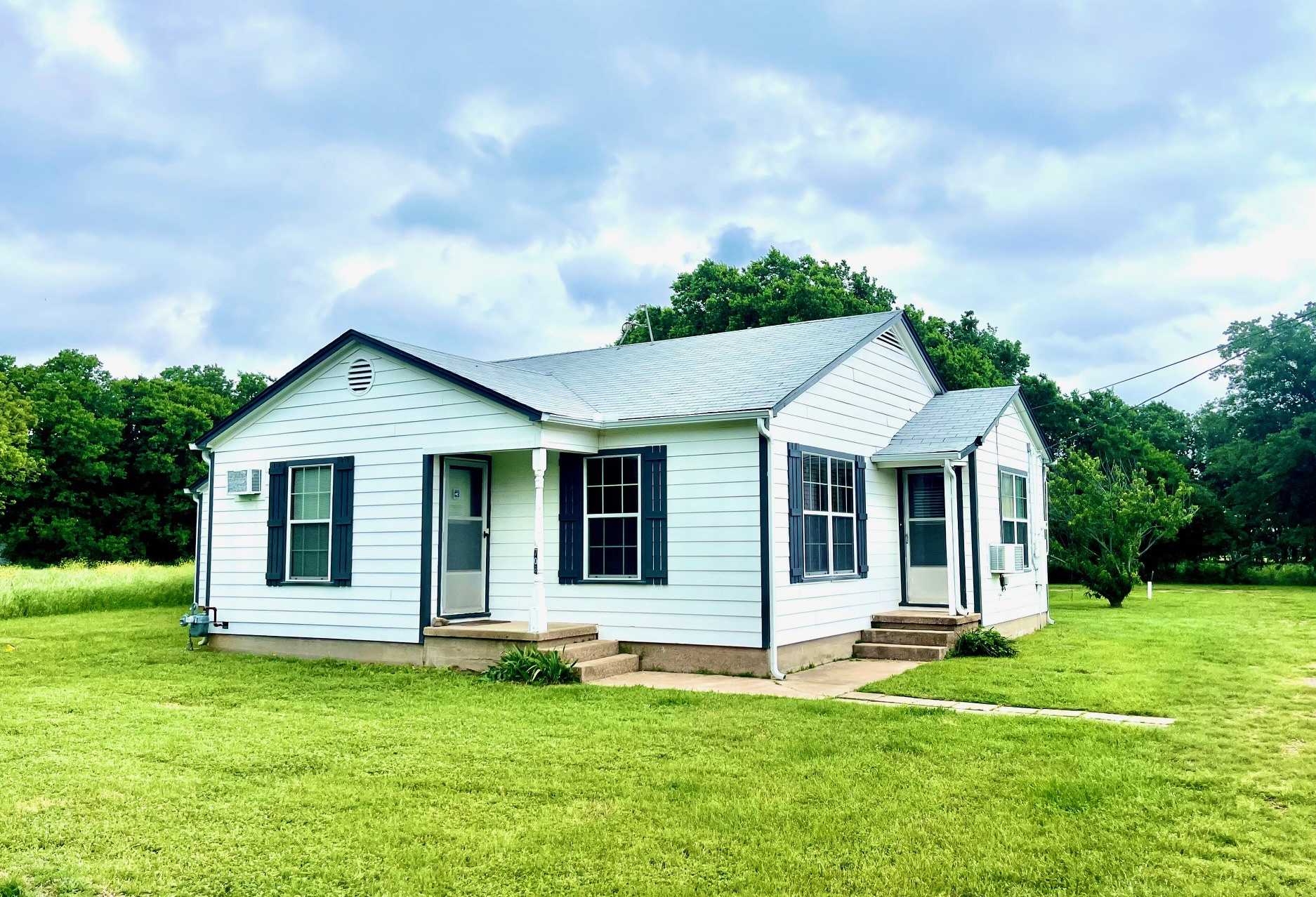 photo 1: 708 S Barron Street, Covington TX 76636