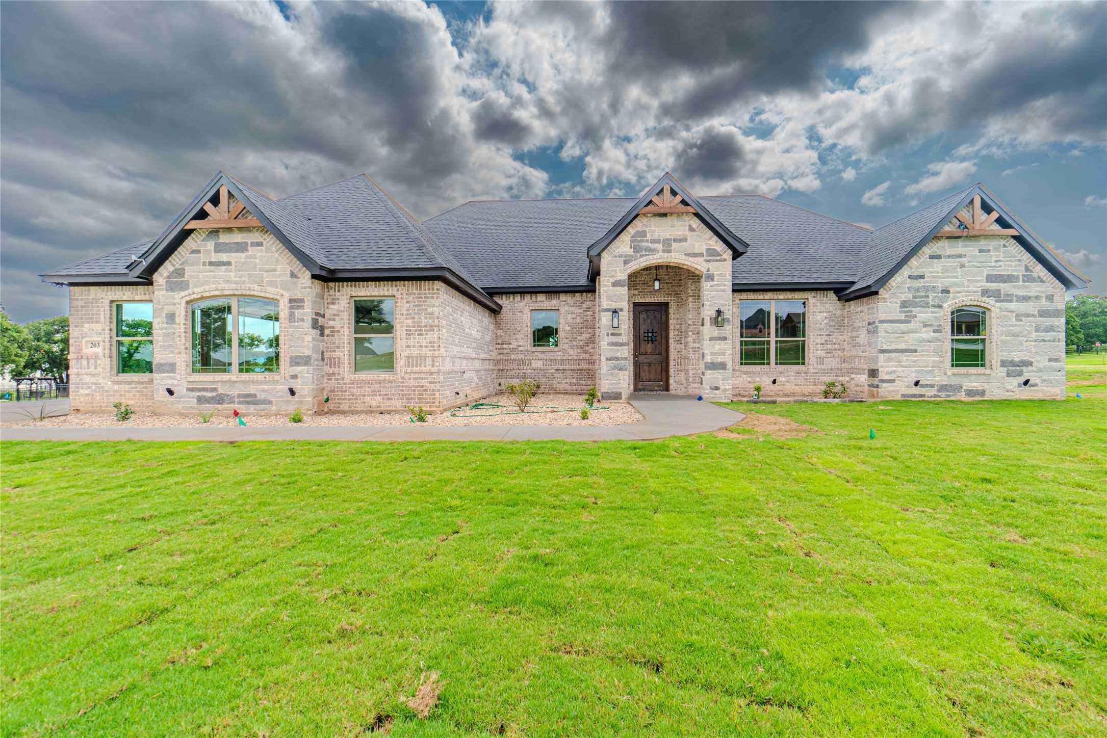 photo 1: 203 Maverick Court, Granbury TX 76049