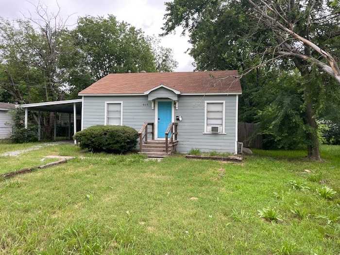 photo 1: 1608 Jefferson Street, Commerce TX 75428