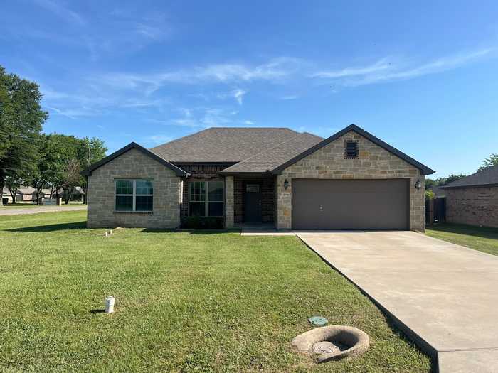 photo 1: 2718 Monroe Street, Commerce TX 75428