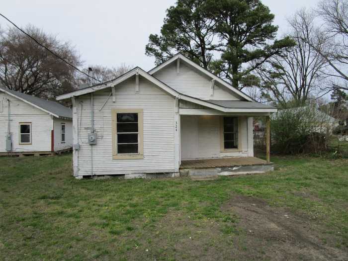 photo 1: 324 NW Beck Street, De Kalb TX 75559