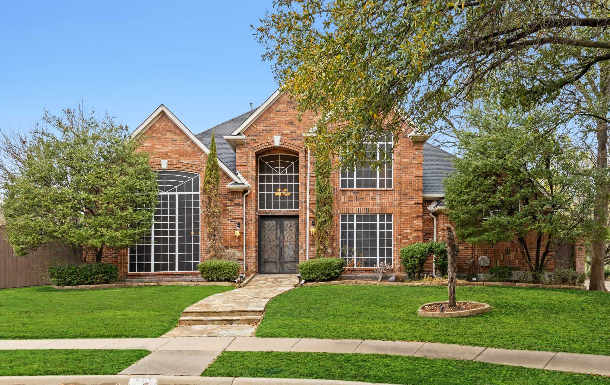 photo 1: 5601 Woodhaven Court, Plano TX 75093