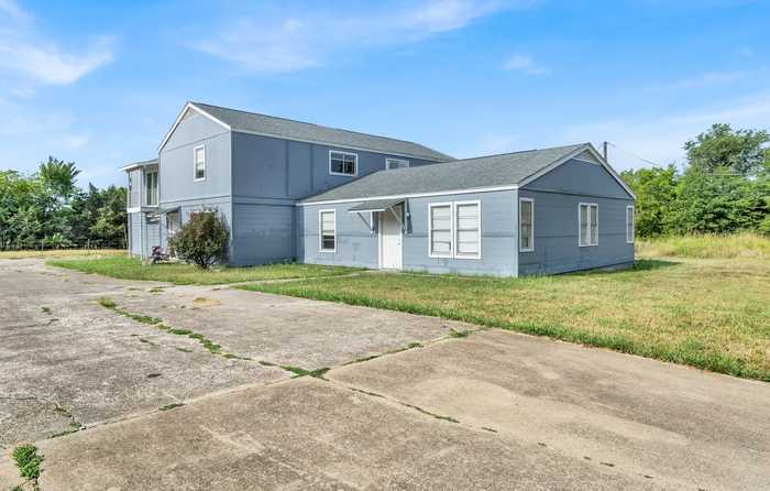 photo 1: 603 Harrison Street, Commerce TX 75428