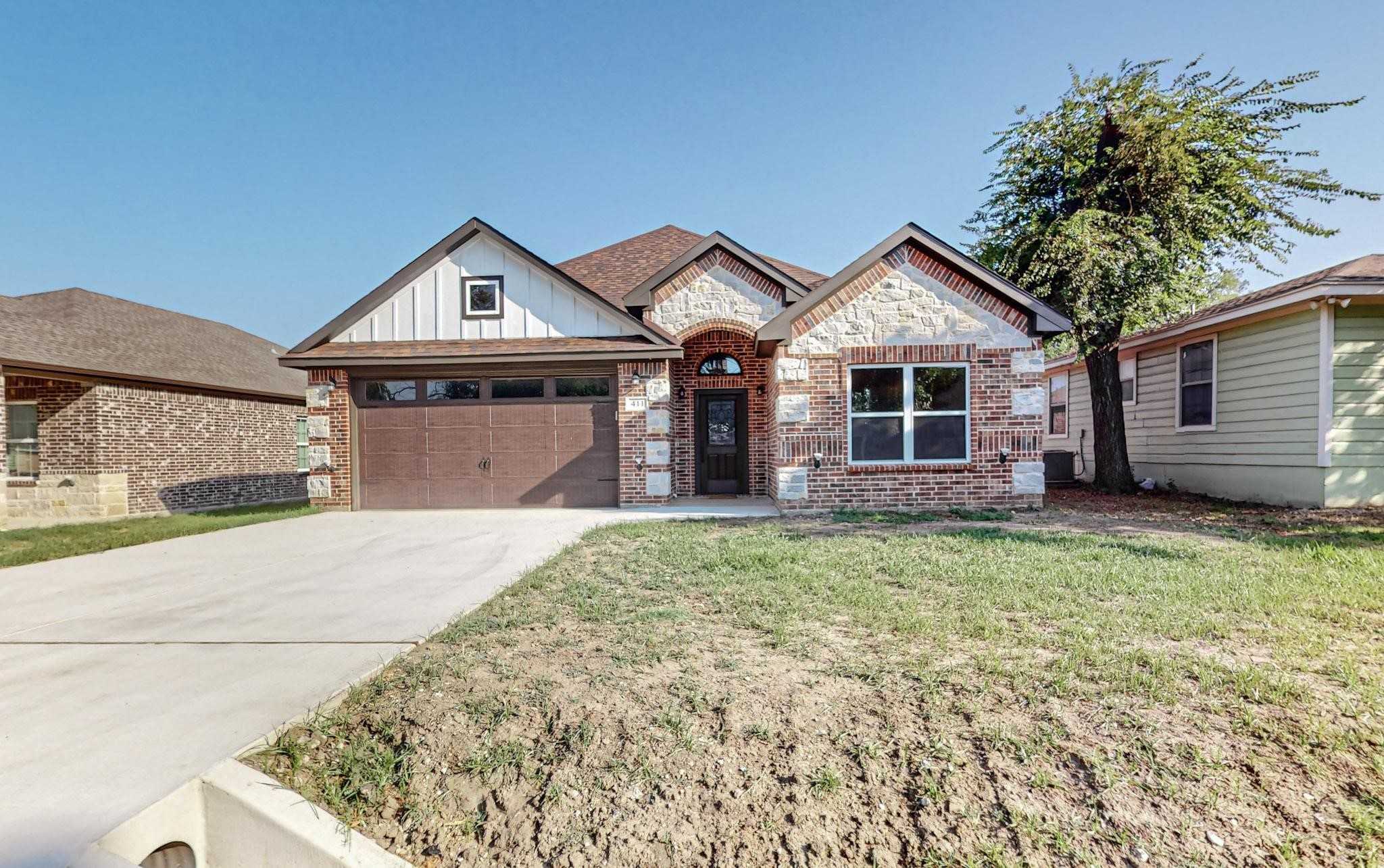 photo 1: 411 Rushing Street, Ennis TX 75119