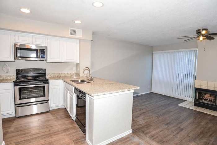 photo 1: 3416 Country Club Drive W Unit 122, Irving TX 75038