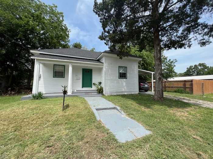 photo 1: 1911 Beach Street, Commerce TX 75428