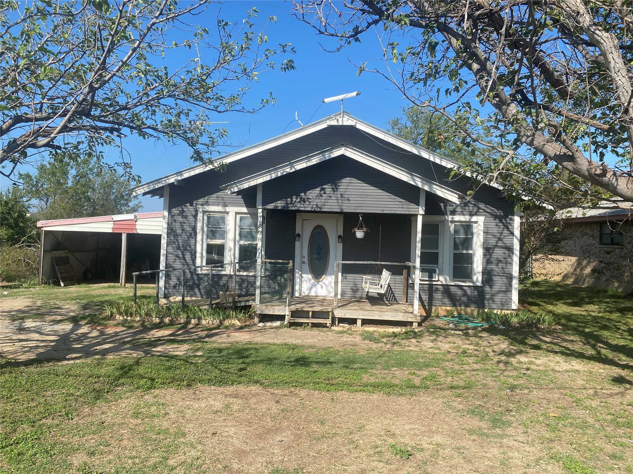 photo 1: 808 Cherry Street, Baird TX 79504