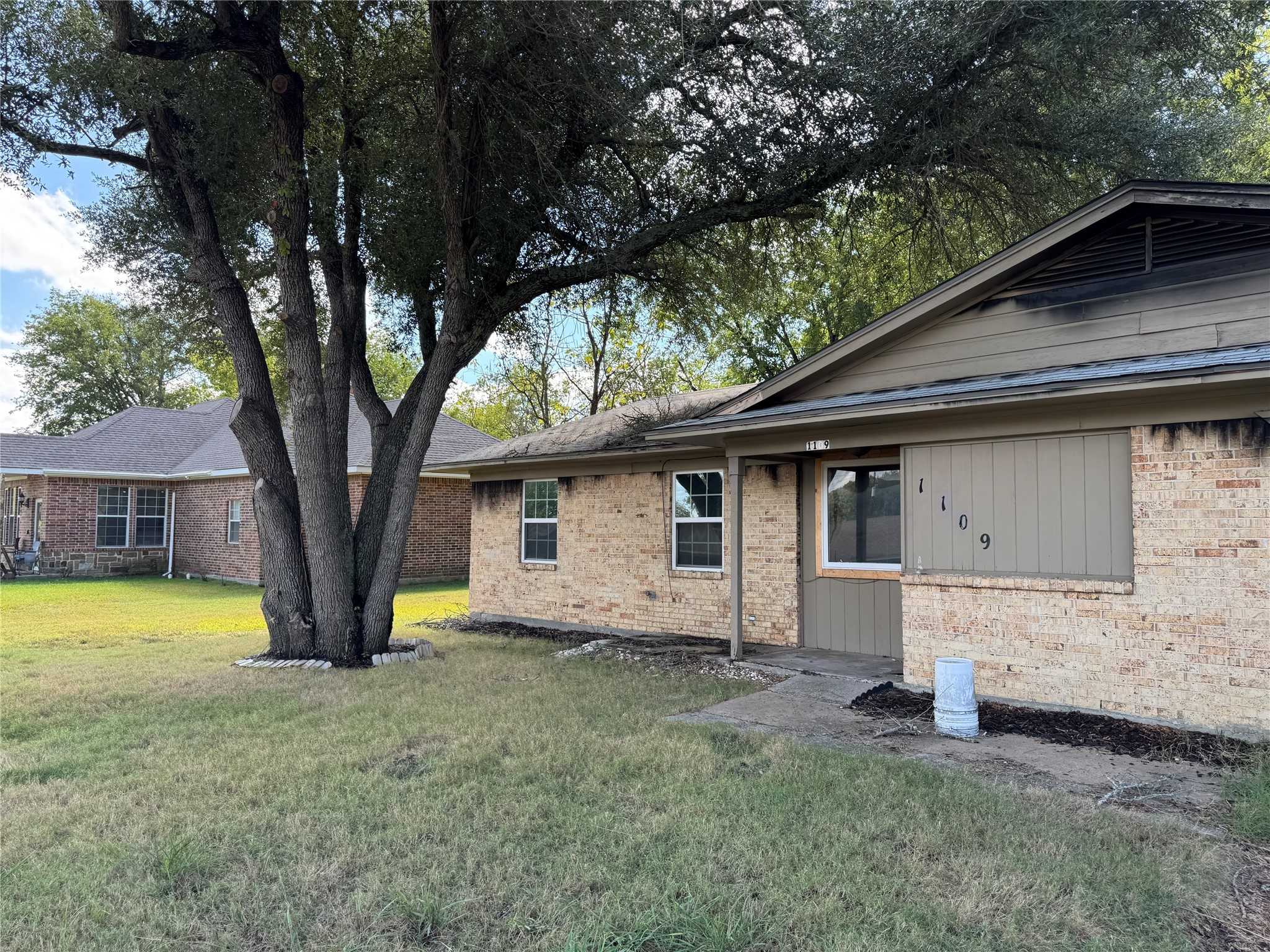 photo 1: 1109 Charlies Drive, Commerce TX 75428