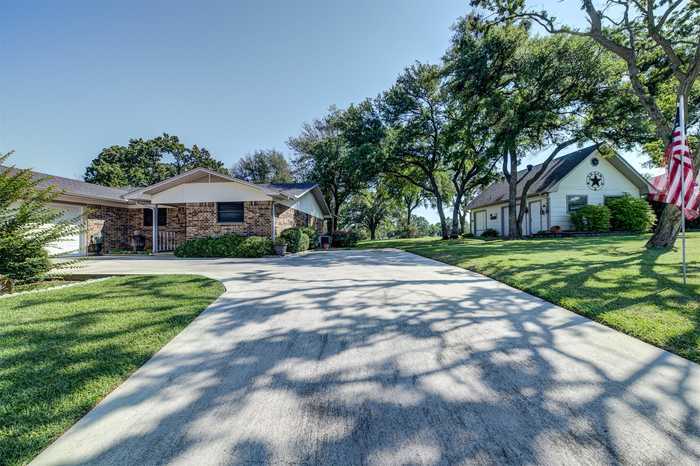 photo 1: 412 Half Moon Way, Runaway Bay TX 76426