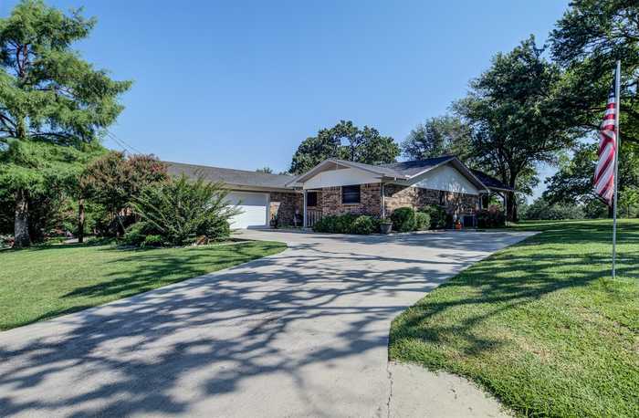 photo 2: 412 Half Moon Way, Runaway Bay TX 76426