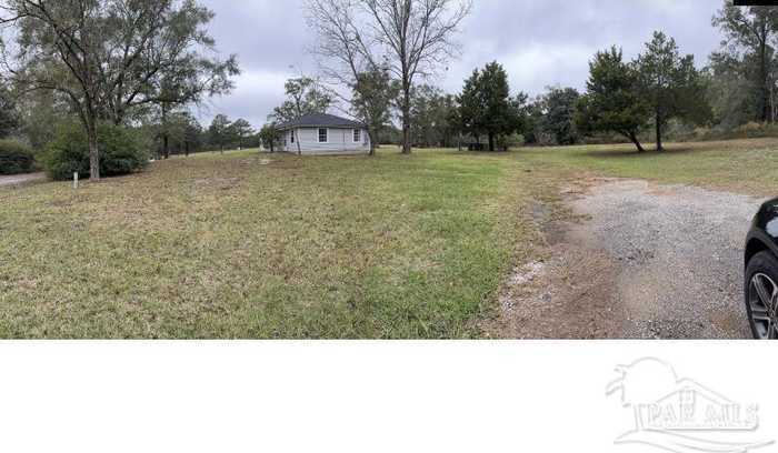 photo 2: 2720 Victor Rd, Mcdavid FL 32568