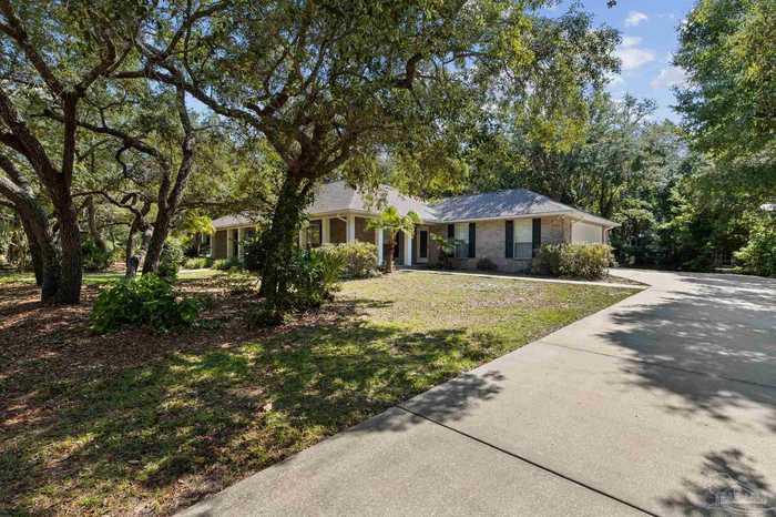 photo 1: 1693 Mohawk Trl, Gulf Breeze FL 32563