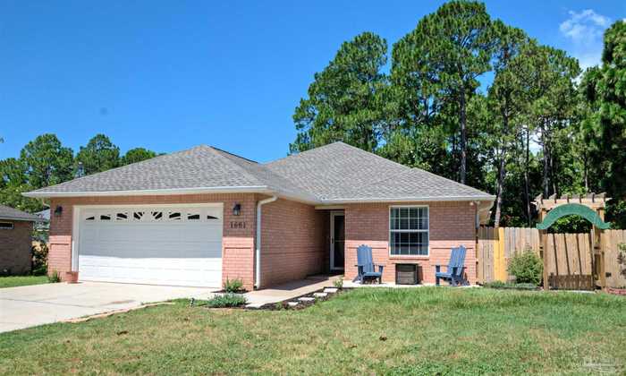 photo 1: 1661 Woodlawn Beach Rd, Gulf Breeze FL 32563