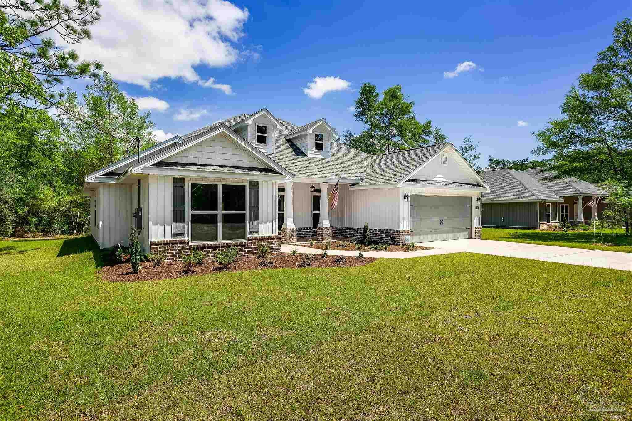 photo 1: 6539 Gentle Rain Dr, Milton FL 32570