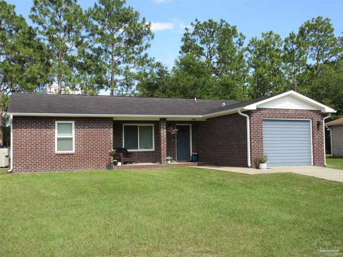 photo 1: 7208 Bogey Ln, Milton FL 32570