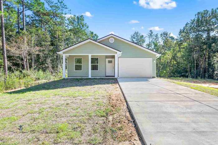 photo 1: 3284 Damon Dr, Milton FL 32583