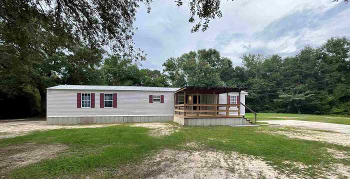 photo 1: 6480 Robie Rd, Milton FL 32570