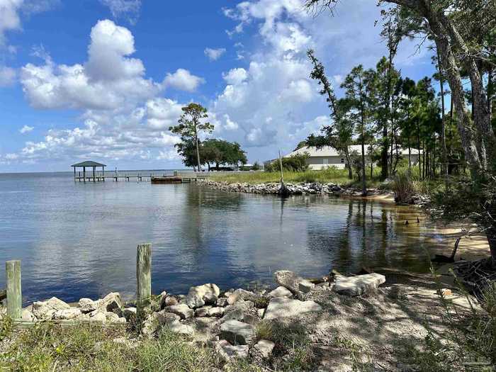 photo 1: 957 Dolphin Rd, Milton FL 32583