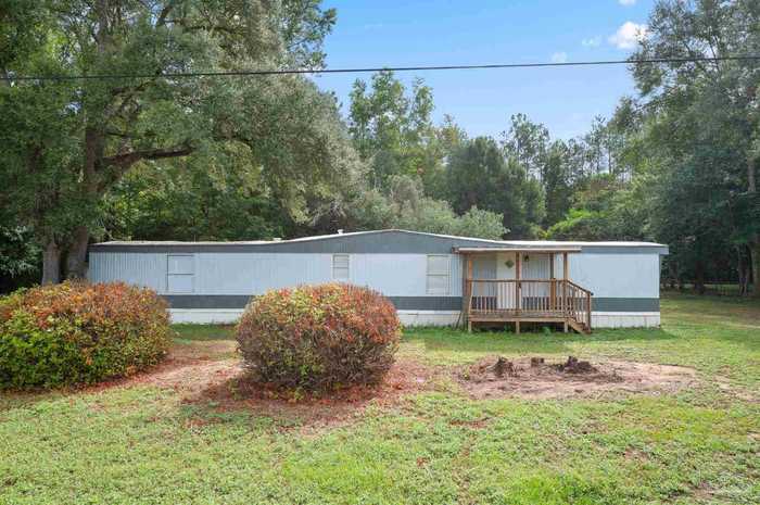 photo 1: 7140 East Gate Rd, Milton FL 32570