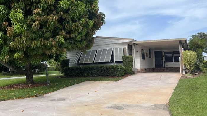 photo 1: 7761 Shenandoah Drive, Hobe Sound FL 33455