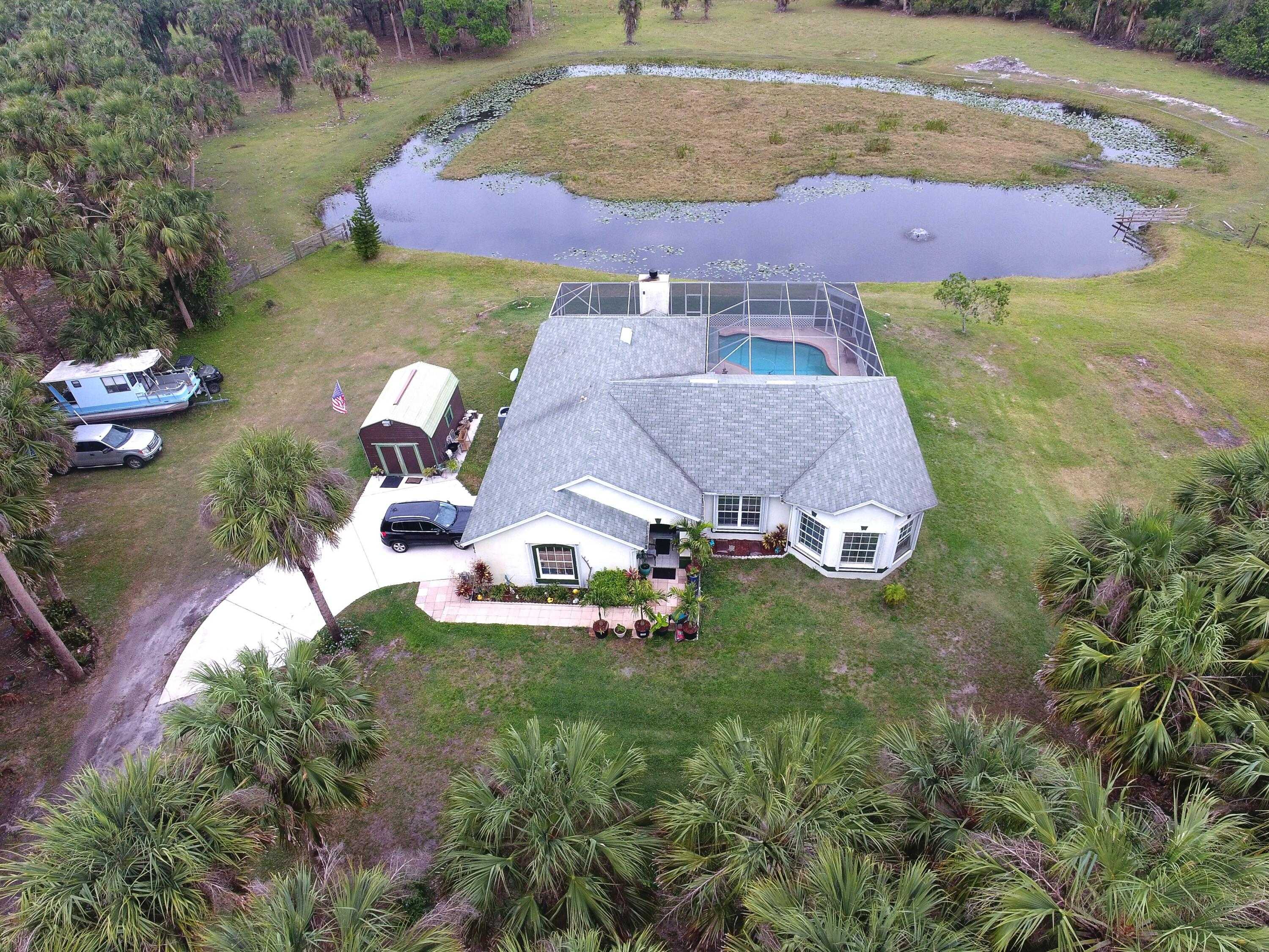 photo 1: 9340 Carlton Road, Port Saint Lucie FL 34987