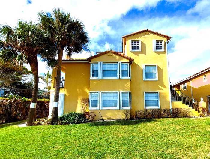 photo 1: 1060 Lake Shore Drive Unit 201, Lake Park FL 33403