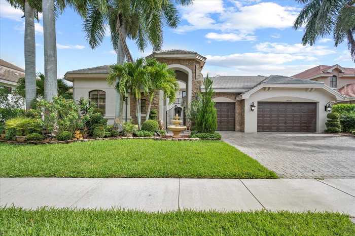 photo 1: 10569 Versailles Boulevard, Wellington FL 33449