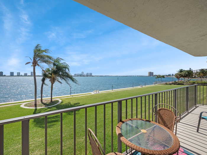 photo 1: 801 Lake Shore Drive Unit 204, Lake Park FL 33403