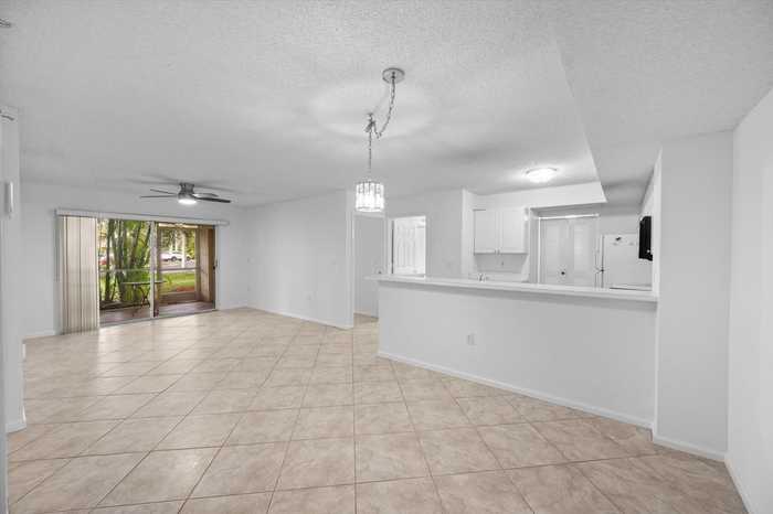 photo 1: 242 Village Boulevard Unit 2110, Tequesta FL 33469