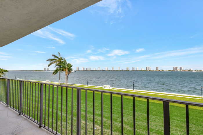 photo 1: 801 Lake Shore Drive Unit 206, Lake Park FL 33403