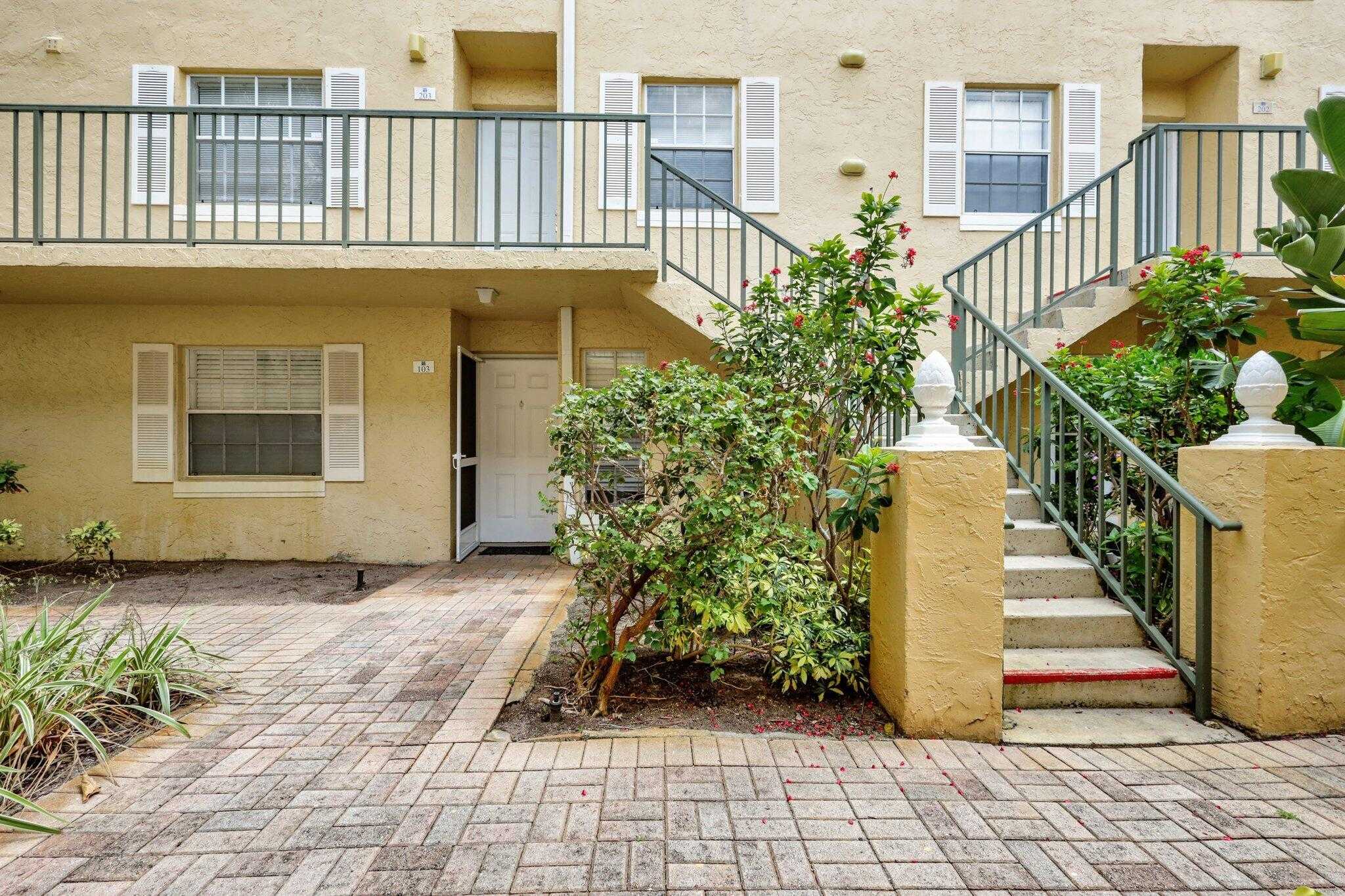 photo 1: 1015 Lake Shore Drive Unit 203, Lake Park FL 33403