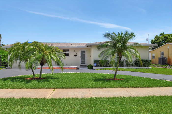 photo 1: 831 Evergreen Drive, Lake Park FL 33403