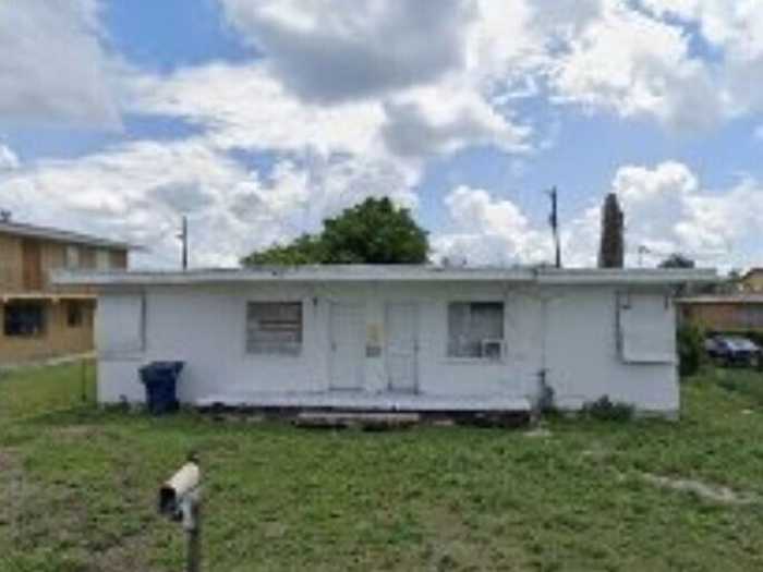 photo 1: 545 10th Street, Belle Glade FL 33430