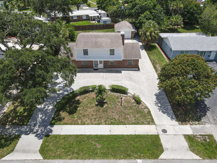 photo 1: 814 Poplar Drive, Lake Park FL 33403